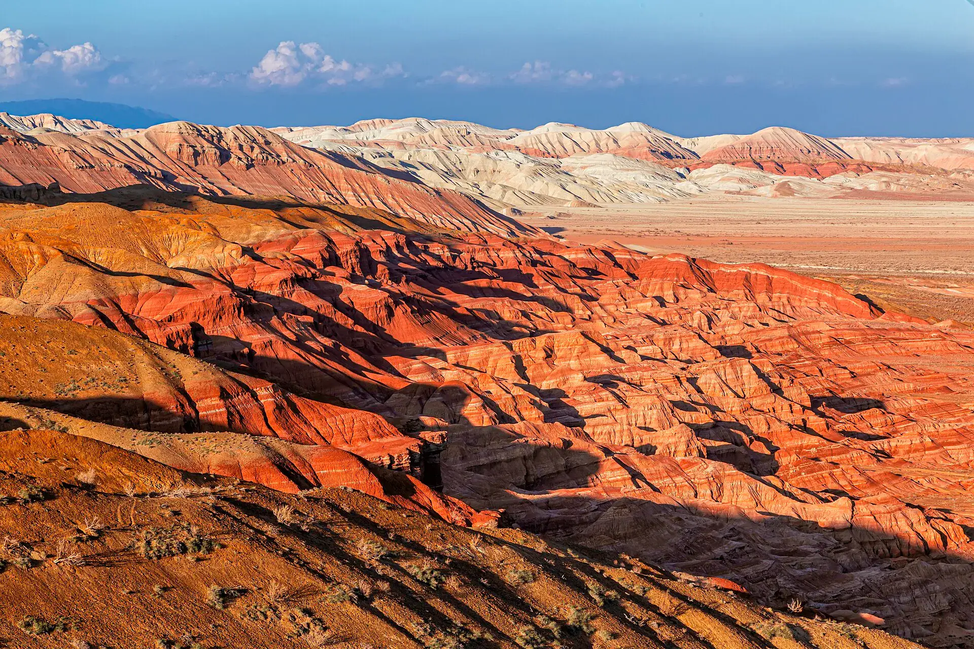 White and ochre chalk cliffs at the Aktau Mountains first viewpoint area.