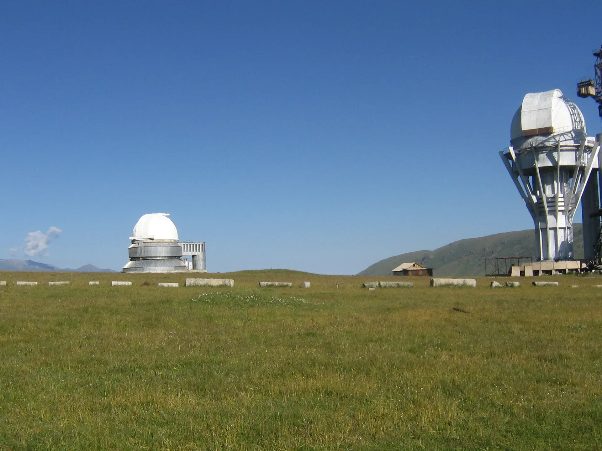 White dome of the Assy-Turgen Astrophysical Observatory against the open sky on the plateau at 2750 m.