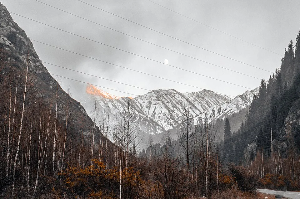 Autumn road through Big Almaty Gorge, the approach corridor above the Ayusay visitor centre.
