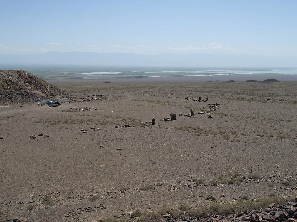 Low Saka burial mounds on the open Altyn-Emel steppe at the Besshatyr necropolis.