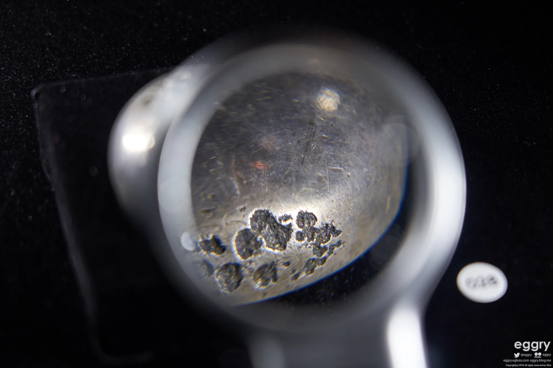 Inscribed bowl from the Issyk kurgan displayed against a dark background.