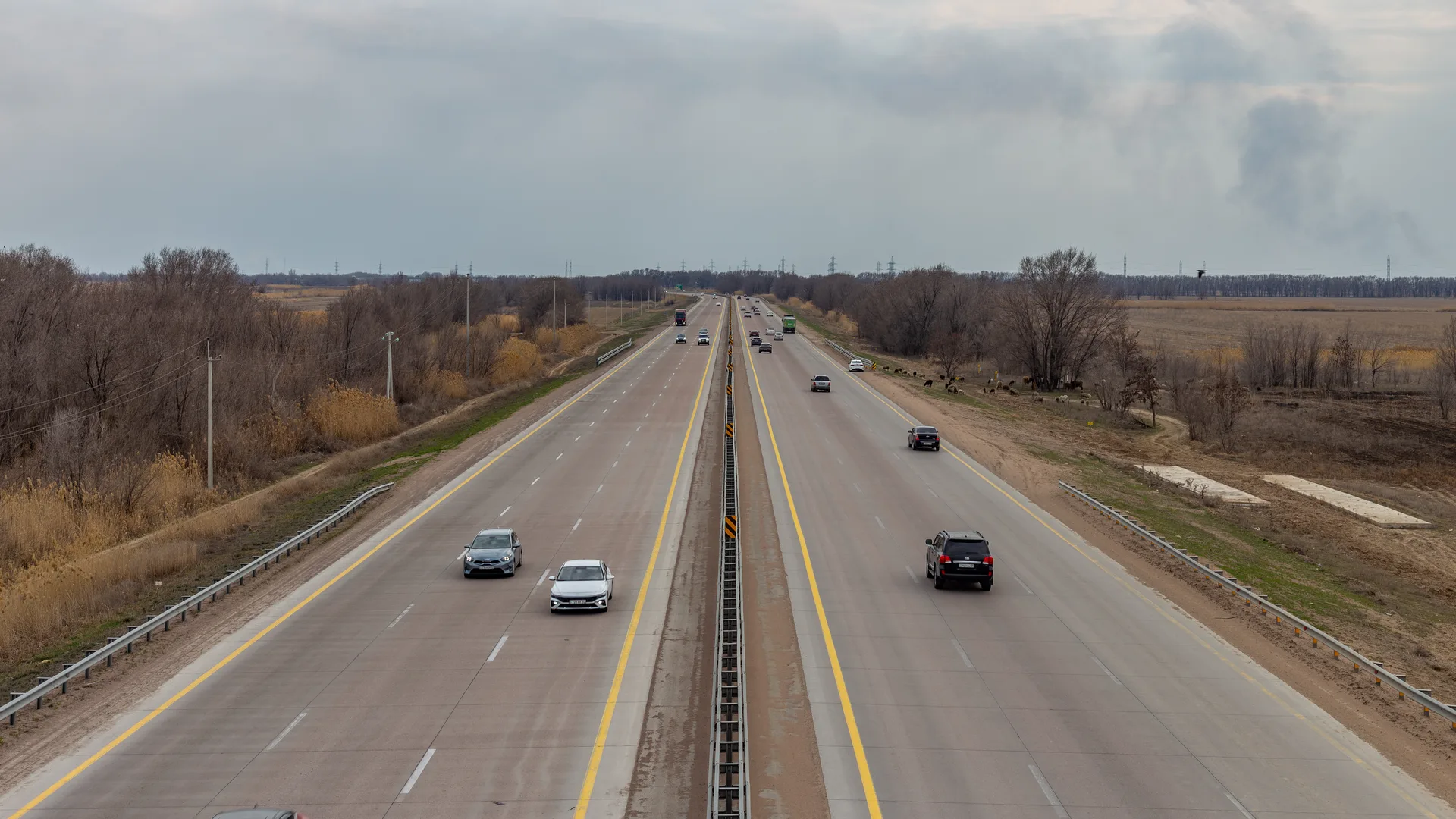 A-3 approach road north of Almaty before the route turns toward Tekeli and Eshkiolmes.