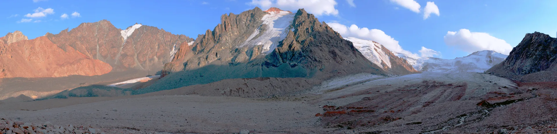 Panoramic glacier and high-ridge terrain near the upper Shymbulak and Talgar Pass area.