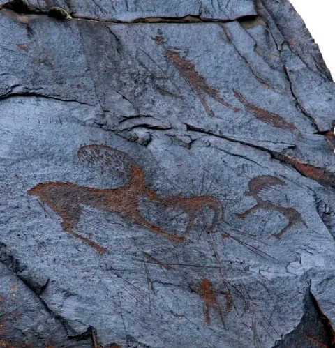 Context near Tekeli Overnight Base: Eshkiolmes petroglyph panel context at the ridge reached after the off-road track.