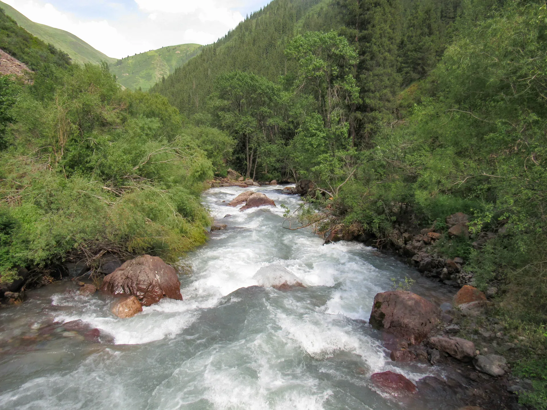 Turgen River beside the forest trail toward Kairak Waterfall in the upper gorge.