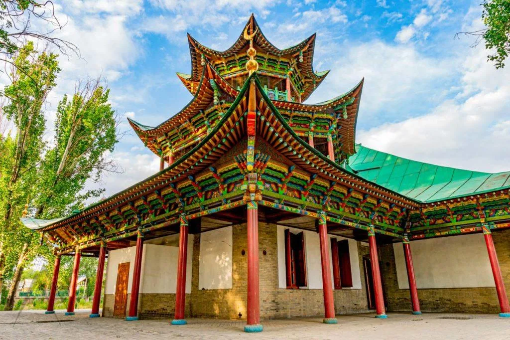 Chinese-style roofline at Zharkent Mosque, a landmark near the bazaar approach.
