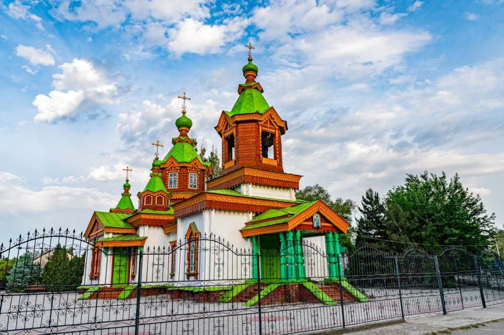 Orthodox church street scene in Zharkent showing the mixed small-town centre.